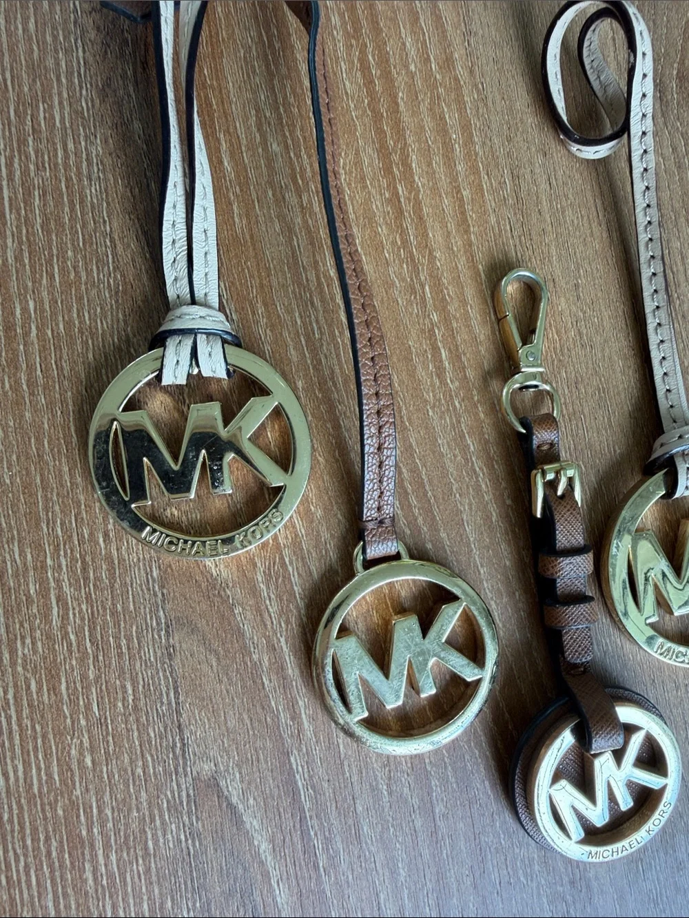 Michael Kors MK Logo Bag Charms Set of 4 Gold Tone Leather Straps